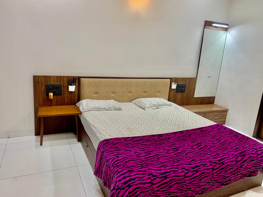 Furnished bedroom inside the Maninagar bungalow